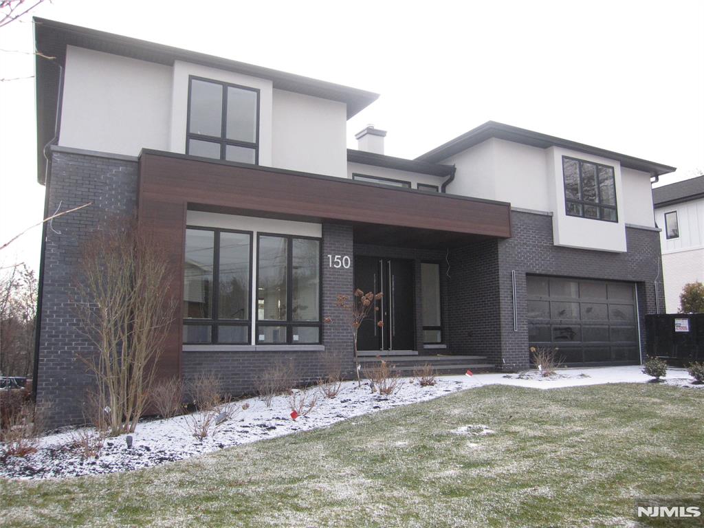 NEW CONSTRUCTION MODERN STYLE. OVER 7,000 SQ.FT.OPEN FLOOR PLAN WITH 9FT. CEILINGS ON THE FIRST FLOOR. TWO STORY EF AND FAMILY ROOM WITH FIREPLACE, LARGE KITCHEN/DINING AREA, WITH QUARTZ ISLAND AND COUNTER TOPS, ALL STAINLESS STEEL APPLS, SUB-0 REFRIGERATOR. ALL BEDROOMS WITH EN SUITE BATH WITH RADIANT HEAT. PRIMARY SUITE WITH LARGE BEDROOM, FIREPLACE, LARGE CLOSETS, AND BATH WITH GLASS STALL SHOWER AND FREE STANDING BATH TUB. FIN BASEMENT WITH REC.ROOM WITH WET BAR, 1 BEDROOM, 1 BATH AND SLIDING GLASS DOOR TO YARD. OAK FLOORING, CUSTOMING CEILING AND STAIRWAY LIGHTING, PORCELANOSA TILES, SPEAKER SYSTEM,CAMERA SECURITY, C/AC,VAC, 3 CAR GARAGE, LANDSCAPING, GENERAC GENERATOR. SMART HOME FEATURES, CONTEMPORARY DESIGN, DEEP YARD AND A GREAT QUIET LOCATION. PREMIER BUILDER, BUILDING LUXURY HOMES SINCE 1981.