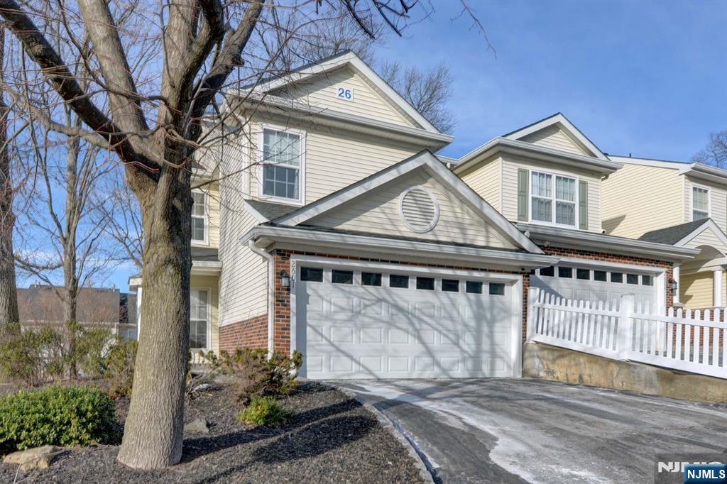 Rare 3 bedroom, 2.5 bath end unit in Berkshire Hills! Walk into this gorgeous townhome with an inviting foyer that leads to the formal dining room, inviting living room and updated eat-in kitchen. Gleaming hardwood floors throughout the main level with a stone gas fireplace, powder room and access to the private deck. The upstairs offers an oversized primary suite with cathedral ceiling, custom walk-in closet, updated full bath with double sink, soaking tub & glass enclosed separate shower. The second bedroom is adorned with a custom closet and private access to the second updated main bath. The 3rd bedroom & full size laundry complete the second level. The large finished basement offers even more entertaining space! A two-car garage is conveniently located right off of the foyer. This desirable community offers a pool & playground and easy access to Rt 10, Rt 46 & NJ Transit trains to NYC. Make this beautiful townhome your own!