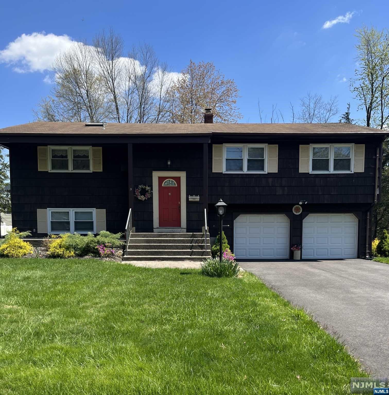 Situated on an oversized lot of 100x150, this well-maintained bi-level home boasts 8 total rooms with 1,983 sq. ft. of ample living space and relaxation. Featuring: living room, formal L-shaped dining room, elk kitchen, master bedroom w/ 1/2 bath, and 3 other bedrooms. Two and one-half total bathrooms. The ground-level rec room has sliders out to the rear yard. There are two entrances to the ground-level recreation room from the living area above, and a side entrance for your convenience. Also, there is a 2-car oversized garage with openers and a storage area. Enjoy sitting out on the maintenance free deck w/ access from the dining room sliders. Below, relax on a patio shaded by the deck above. An expansive rear yard for you to have fun and frolic.