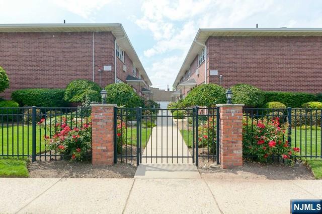 Convenient condo in beautiful garden setting. Just 2 blocks to train or bus. 1 block to grocery store. Laundry room onsite. This very affordable 1st floor condo won't last long! Living room has wood floors and south facing windows - lots of sun! Kitchen has oak cabinets, tile floor and updated appliances including dishwasher, stainless microwave, gas stove, refrigerator. Bedroom has double closet and bathroom with updated tiles and oak vanity. Newly renovated bathroom! Laundry room sparkles and is just a few steps from your front door. This complex has only 20 units, so it's quiet and beautifully landscaped with hydrangeas, roses, etc. No pets, please.