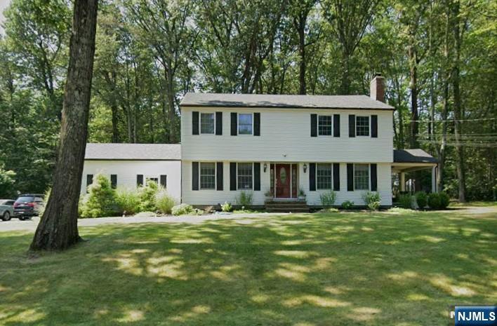 Nestled in one of Woodcliff Lake's most coveted and serene neighborhoods, this Colonial presents a rare opportunity to own nearly 3/4 of an acre of Bergen County prime real estate on the hill. The home features 4 bedrooms, with the possibility of a 5th, and 1.5 baths, alongside a finished basement and a 2-car attached garage. Significant updates include a new roof, whole house generator, central air, and a new hot water heater, offering great peace of mind. With endless potential. Enjoy the convenience of being near transportation, shopping, schools, parks, and houses of worship.