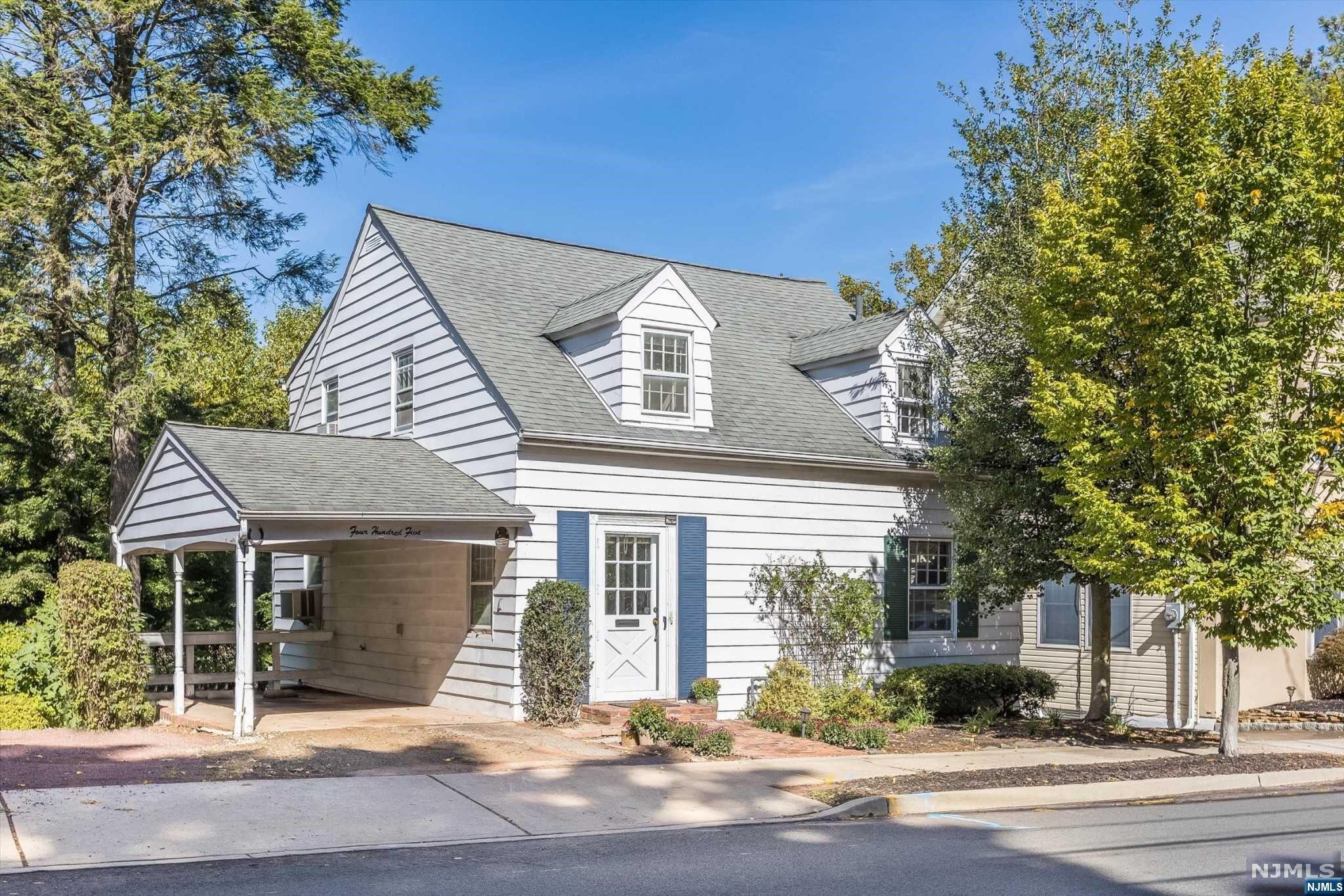 Cozy Cape Cod on the Park! This home backs up against one of Nutley's most popular parks, Memorial Park. Enter into large, welcoming foyer. Open concept living and dining room with beamed ceilings give you a homey feel. Built in book shelves and wood burning fireplace make this a perfect area for entertaining. Two glass paned doors invite you into window encase sunroom overlooking backyard. Second floor boast three well sized bedrooms, full bath AND powder room. Two of the bedrooms have access to second floor porch; great for a fall evening drink or morning coffee. Full basement walk out to brick patio with steps down to second stoned patio with plenty of green space. Access to park right through a few branches towards back of yard. Close to NYC bus, one block away from jitney pick up to Delawanna train station, and short drive to major highways. Close distance to developing ON3 campus with Hackensack Med School/Meridian. Great chance to own in the suburbs!