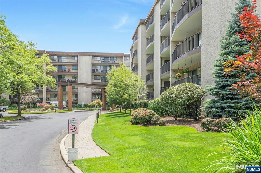 This sophisticated apartment delights from first entry. It offers a bright open floor plan allowing for personalization of an extensive living space. Similarly, the bedroom is oversized and ensuite with two walk-in closets and an updated two room bath. A half bath offers additional convenience. Large sliders from the living area access a 30 ft. bslcony with beautiful views. Just completed renovations include beautiful new floors, new paint throughout, and all new stainless steel appliances.. Its spacious kitchen opens to the dining area, but has room for a table as well. This most desirable complex offers an HOA inclusive of all utilities and any amenity you could ask for: laundry on the floor, assigned outdoor parking, extra storage space, a stunning pool, tennis courts, exercise room, extra storage, community rooms, welcoming entrance area, lovely landscaping with wooded grounds - and a location convenient to shopping, restaurants - all an easy commute to NYC. Contact listing agent, Regina Sheeran (973 479-7400 for a showing