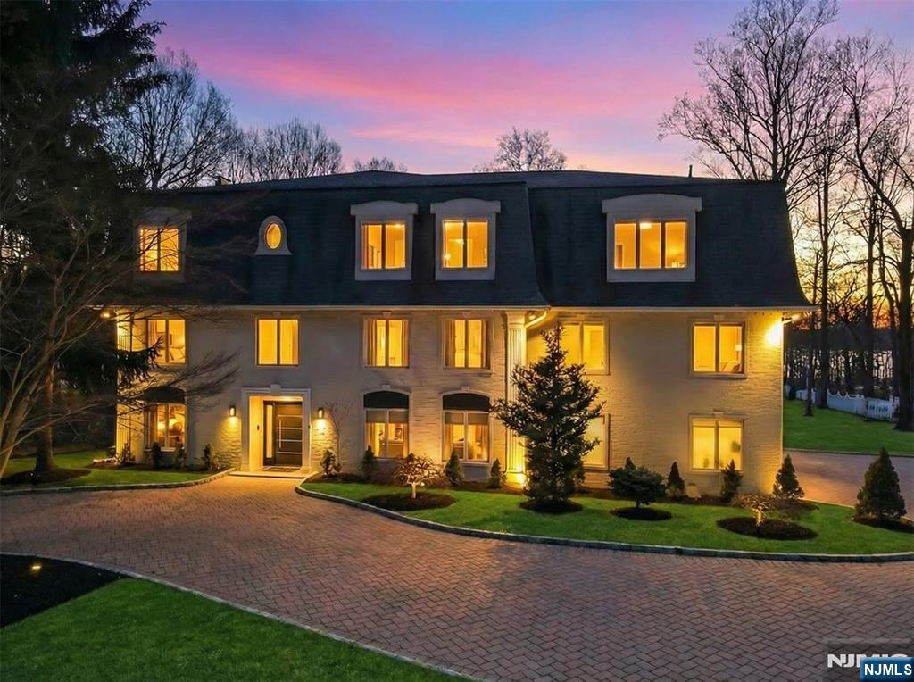 Welcome to 99 Ogle Rd, Old Tappan, a beautifully maintained and expanded brick Colonial set on nearly three acres with picturesque golf course views, located within the townâ€™s highly sought-after Blue Ribbon school district in one of Bergen Countyâ€™s most desirable communities. Spanning approximately 6,000 square feet, this impressive home offers a spacious and functional layout designed for both comfortable everyday living and elegant entertaining. Sun-filled interiors, generously sized rooms, and refined architectural details create a warm and inviting atmosphere throughout. Highlights include soaring cathedral ceilings, multiple fireplaces, and a gourmet kitchen with a large center island, quartz countertops, and high-end stainless steel appliances that flows seamlessly into the main living areas. The home also offers exceptional versatility with a private guest suite and multiple living and recreation spaces. Enjoy comfortable bedrooms, well-appointed baths, and ample storage throughout. The beautifully landscaped property provides space to relax, entertain, and enjoy the peaceful surroundings. Conveniently located near top-rated schools, parks, shopping, and major highways, this home presents a rare opportunity to own in prestigious Old Tappan.