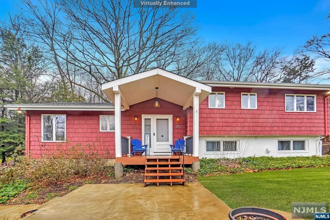 Nestled in the heart of lower West Milford, NJ, this charming home is a true sanctuary. Enter inside to discover a beautifully renovated interior featuring three bedrooms, three bathrooms and ample living space spread across multiple levels. So many recent updates: new kitchen with new SS appliances, Quartz counters and Oak floors, refinished oak floors throughout, all bathrooms updated, newly finished lower level family room, new gas fireplace, new siding, new roof, new Trex porch, new patio/walk, new heating/hot water/water filter/softener, and a brand new septic (2022). Public water, natural gas. Open floor plan, great for entertaining, plenty of outdoor spaces with 2 patios. The fully finished basement provides even more living space, perfect for a home office, media room, or gym. Outside, the property truly shines with its expansive lot spanning over half an acre, Heated 2-car garage. This home checks all the boxes for both convenience and luxury.