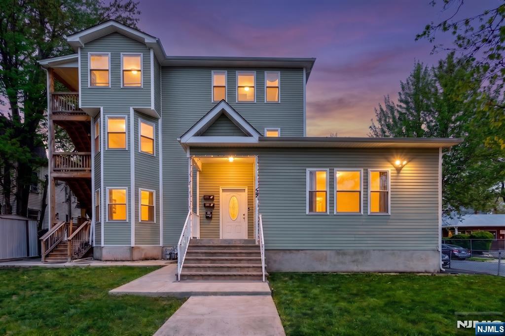 Welcome to beautiful three-family home. This turnkey property offers modern construction, strong income potential, and exceptional versatility for both investors and owner-occupants. Each unit features a spacious and well-designed layout with 3 bedrooms and 2 full bathrooms, while the first-floor unit stands out with 3 full bathrooms it's ideal for added convenience and flexibility. All units showcase updated kitchens with contemporary finishes, stainless steel appliances, and open-concept living and dining areas filled with natural light. The home has been completely upgraded with brand-new, separate heating and central air conditioning systems for each unit, ensuring efficiency and individual control. Additional highlights include modern flooring, updated bathrooms, and thoughtfully designed interiors throughout. The fully finished basement offers incredible bonus space, perfect for recreation, storage, or potential additional living flexibility. Exterior features include a large private driveway with ample off-street parking, a rare and valuable amenity for a multi-family property. The property also boasts updated siding, newer roofing, and a clean, well-maintained appearance. Whether you're looking to live in one unit while generating rental income or expand your investment portfolio, this property checks all the boxes with its strong layout, and desirable features. Don't miss this exceptional opportunity!