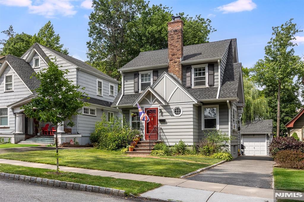 Classic Glen Ridge charm meets everyday functionality in this beautifully maintained home, where original architectural details have been thoughtfully preserved and cared for over the years. Warm and inviting, the main level offers a spacious living room anchored by a fireplace, with an adjoining office area that creates a versatile and comfortable gathering space. A large entry closet provides the convenient storage everyone wants and needs. The dining room leads to the light-filled sunroom, offering year-round enjoyment as a playroom, home office or play to relax. The eat-in kitchen features granite countertops, plentiful cabinetry, and ample room for casual meals and conversation. Upstairs are three well-proportioned bedrooms, each offering comfortable living space and abundant natural light. A walk-up attic with an attic fan provides excellent storage today and exciting potential for future expansion. Downstairs, the finished basement is equipped with French drains and a sump pump, offering added confidence and peace of mind. Outside, mature landscaping surrounds the property, creating a serene backyard setting with privacy and natural beauty. Perfectly positioned in one of Glen Ridge's most desirable neighborhoods, this home offers easy access to both the Glen Ridge and Bloomfield train stations for a convenient NYC commute. Residents enjoy access to Glen Ridge's highly regarded public schools, beautiful parks, and the shops and restaurants of nearby downtown districts.