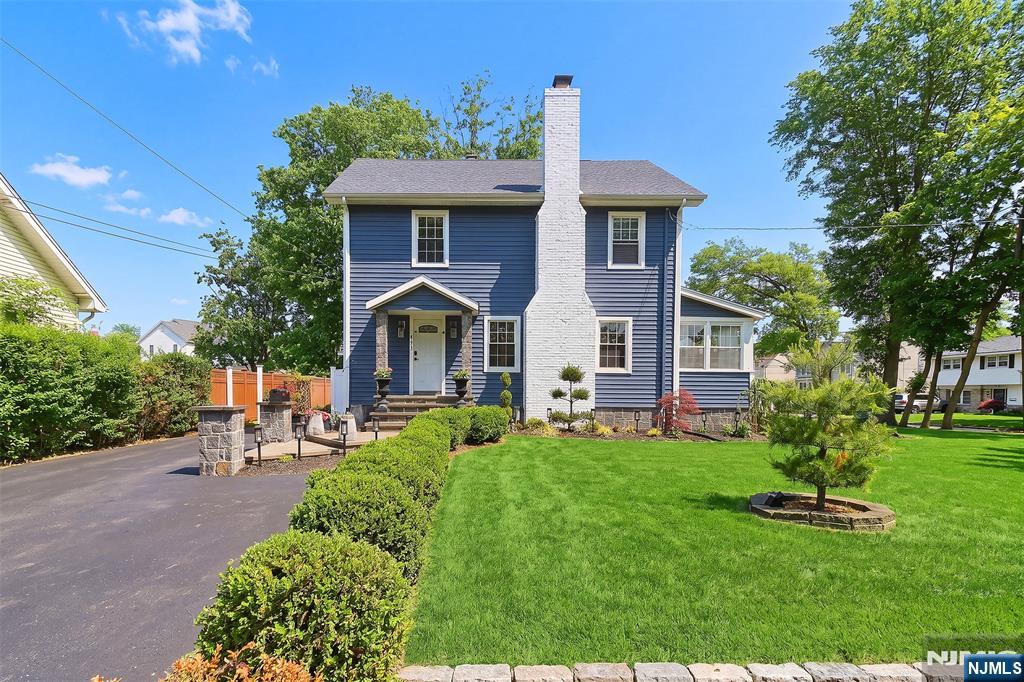 Do not miss this stunning, thoughtfully updated home on a quiet street in the sought after town of New Milford. Nothing to do but move in! This four bedroom, two-and-a-half-bath residence combines modern renovations with comfortable everyday living in one of Bergen County's most sought-after communities. The main level features a bright living room with a fireplace that anchors the space and offers a natural focal point for gatherings. An updated kitchen provides efficient workflow, ample storage, and direct connection to the dining area, creating a practical layout for cooking and entertaining and the oh so beautiful enclosed sun porch for relaxing all year round plus a beautiful powder room. Upstairs, three well-proportioned bedrooms and one full bath support a balanced separation between shared and private spaces. The renovated baths offer clean, contemporary finishes that complement the home's overall design. The finished basement has a summer kitchen ,bedroom and a full bath plus a family room and additional storage and laundry. The house sits on a beautifully hardscaped and landscaped oversized corner lot with a hot tub and bar-b-q area. Located near shops , parks, and transportation options.