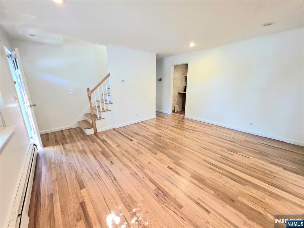 Quiet block with open layout colonial, ready to move-in. Close to all, great school and easy commute to NYC and major highway access. Whole house newly painted, newly finished floor (1st and 2nd fl). Nice private yard with mudroom/sun room. Nice 2-3 car driveway with one car garage. *** Pleasure to show.***