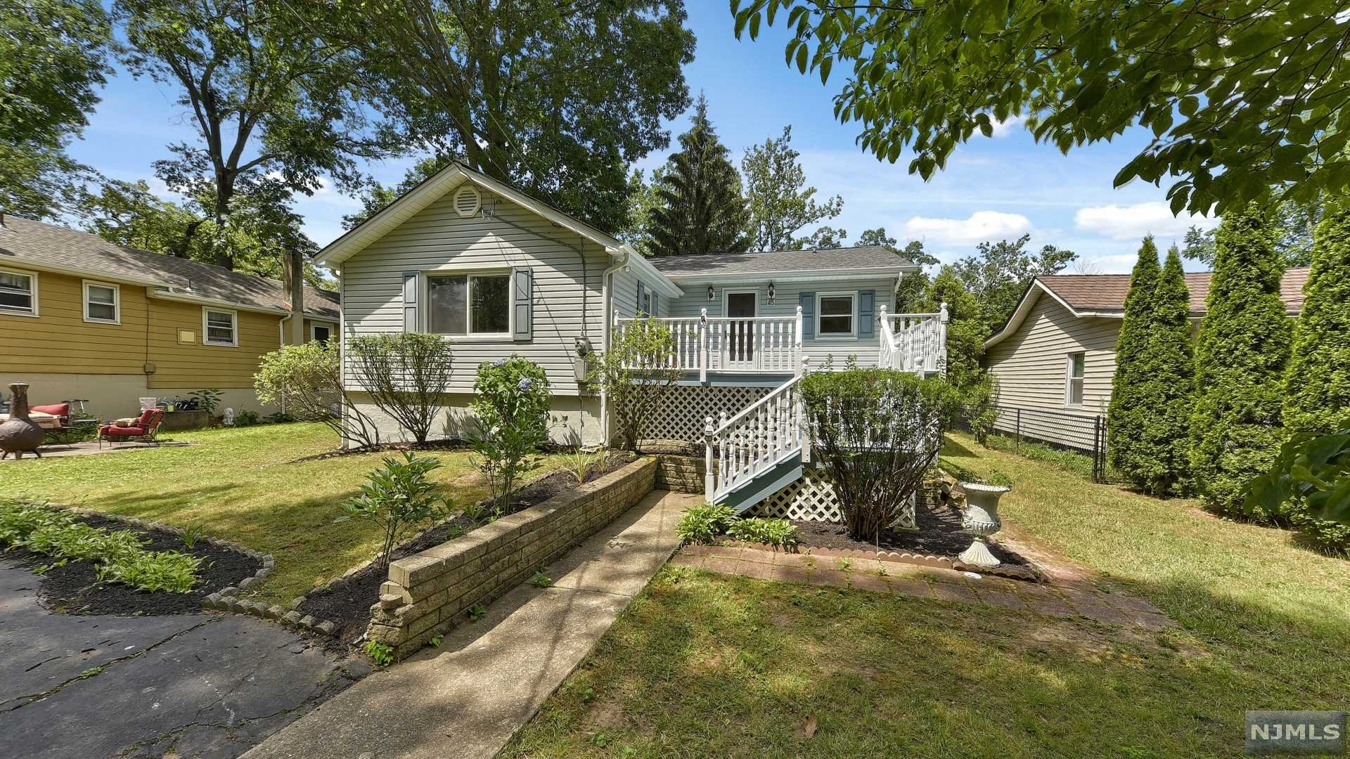 Home Sweet Home! This 2br/1ba ranch is so charming with it's waterfront location with dock/deck! Welcoming and freshly painted front deck leads you into the tiled entry foyer. Kitchen has lots of counterspace and cabinetry, and a dining area. Living room w/hardwood floors and lovely picture window with rear yard and water views! Master bedroom with dbl closets, 2nd bedroom has walk-in-closet. Full bath with tub/shower. Basement storage! Beautifully landscaped large yard with long driveway for offstreet parking. Buyer resp. for town CCO. Home is priced to sell! Dwelling is in 500x flood plain and lender may require flood insurance.