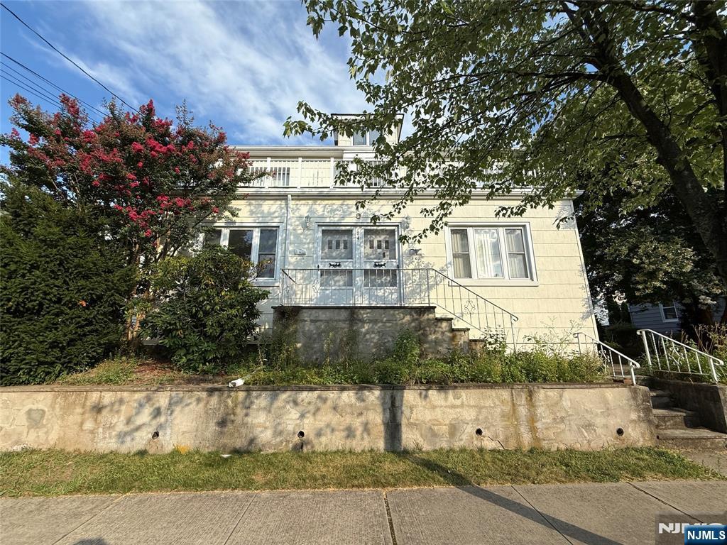 Move-in ready first-floor apartment in a well-maintained two-family home. This bright and comfortable unit features an entrance foyer, living room, dining room, and a spacious eat-in kitchen with a refrigerator included. It offers one bedroom plus a second small bedroom or den, a full bathroom, and a large walk-in closet, along with access to the basement for storage and laundry. Heat and water are included, while the tenant pays electric and gas. One assigned parking space is provided. No pets and no use of the backyard. Credit check and proof of income required.