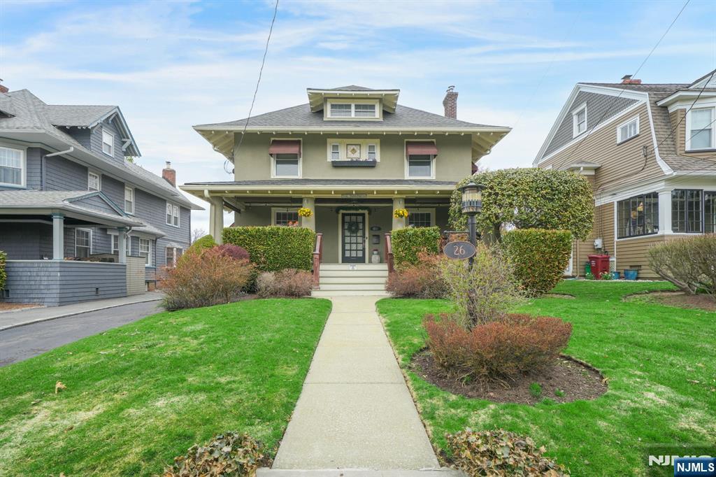 Completely renovated while preserving the character and craftsmanship of this 120-year-old residence, this home delivers a rare blend of history, beauty, and modern comfort. The quality, value, and integrity of this exceptional property are undeniable. Enjoy quiet mornings or evening gatherings on the spacious private front porch or retreat to the back deck overlooking a park-like backyard, perfect for entertaining. Inside, modern upgrades include central air conditioning for year-round comfort and a fireplace that adds warmth and ambiance on colder nights. The second floor features a classic clawfoot soaking tub, offering a timeless space to unwind. Set on a peaceful street in the Spring Garden section of town, this 1906 home was designed by renowned architect William Lambert. Ideally located near Nutley parks, downtown, NYC transportation, Hackensack Meridian School of Medicine, and Spring Garden School. Original details remain beautifully intact, including stucco exterior, rich chestnut woodwork, stained glass windows, a leaded glass corner cabinet, parquet floors in the living and dining rooms, decorative ceilings, and intricate wall and floor trim. This is not just a home. It is a piece of Nutley's history, thoughtfully brought into the present.