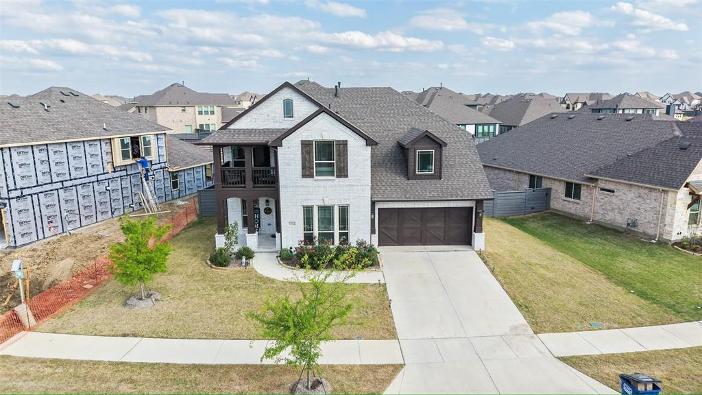 Showcasing approximately $50,000 in premium upgrades, this exceptional north-east facing residence in the highly desirable Union Park community offers a perfect blend of luxury, comfort, and modern convenience. Ideally located with easy access to US-380 and zoned to acclaimed Prosper ISD schools, this home is designed for elevated living.

Thoughtfully crafted for both everyday comfort and sophisticated entertaining, the home features an expansive game room and a fully built, elegantly furnished home theater—perfect for immersive movie nights and gatherings.

The home is appointed with added conveniences including a refrigerator, washer, and dryer, all included in the sale. The garage is equipped with a Tesla EV charging port, catering to modern lifestyle needs. A charming second-floor balcony provides a private retreat—ideal for relaxing evenings with family and friends.

Step into your outdoor oasis featuring a beautifully designed backyard with a pergola, extended concrete patio, and a swing—creating the perfect setting for gatherings or quiet relaxation.

Enjoy a low-maintenance lifestyle with front yard care and community security managed by the HOA. Union Park offers resort-style amenities including scenic walking trails, multiple clubhouses, a dog park, tennis courts, and basketball courts.

An on-site elementary school within the community adds to the home’s convenience, making daily routines seamless.

Buyer and Buyer’s Agent to verify room dimensions.