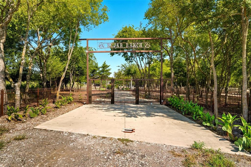 HOME SWEET HOME! Whether you’re looking for a peaceful getaway, a vacation home or a property that blends tranquility with entertaining, this 10+acre estate is your perfect escape. Seller thoughtfully renovated this property with a perfect mix of rustic charm and modern conveniences. The main house exudes warmth and character, with upgraded finishes throughout. With multiple living areas, an open-concept kitchen, and large windows that bring in natural light, this home offers a welcoming and functional layout, ideal for family gatherings and entertaining. Updated Kitchen & Bathrooms: Enjoy modern fixtures and appliances that blend beautifully & creating a space perfect for cooking, relaxing, and enjoying time with loved ones. The combination of the remodeled main house with a wrap around porch, guest house is a mobile home with porch, outdoor spaces, new concrete driveway and natural beauty makes this property an exceptional choice for anyone looking to enjoy Texas-style living in comfort and style. Don't miss out on this rare opportunity to own a piece of paradise with ample space to create memories for years to come! Hurry, send your offer TODAY!