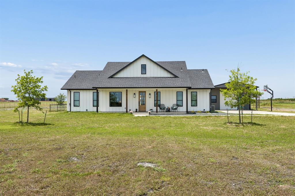 Modern farmhouse living, wide-open spaces, and RESORT-style amenities come together on this EXCEPTIONAL 10-acre property! Built in 2023, this PRIVATE RETREAT offers all the benefits of country living without sacrificing comfort, STYLE, or convenience. The Beautifully designed main HOME features just under 2,000 square feet with 4 bedrooms and 2 bathrooms, offering a functional layout filled with modern finishes and lots of natural light. Whether you're gathering with family or entertaining friends, this home provides the PERFECT setting for everyday comfortable living. Outside, the property truly shines. A brand-new POOL and SPA create a RESORT-like atmosphere, while the surrounding turf and putting green offer low-maintenance enjoyment YEAR-ROUND! The fenced backyard provides a secure space for pets and play, making it easy to enjoy the outdoors. A separate GUEST HOUSE adds incredible flexibility and is currently being used as a salon, home office, and movie room, making it ideal for remote work, hobbies, guests, or a future income-producing opportunity. The detached 24' x 35' metal building offers ample space for a workshop, garage, equipment storage, or recreational vehicles. As you enter through the electric security gate, you'll travel approximately 1,000 linear feet along a solid concrete driveway that winds its way to the home, creating an impressive sense of arrival and privacy. The property also features a pond, custom-built chicken coop, and plenty of room to embrace a PEACEFUL rural lifestyle. This is MORE than a home—it's a LIFESTYLE! Whether you're dreaming of a hobby farm, a private family retreat, or simply more space to enjoy life, this unique property offers endless possibilities and the opportunity to own something truly special.