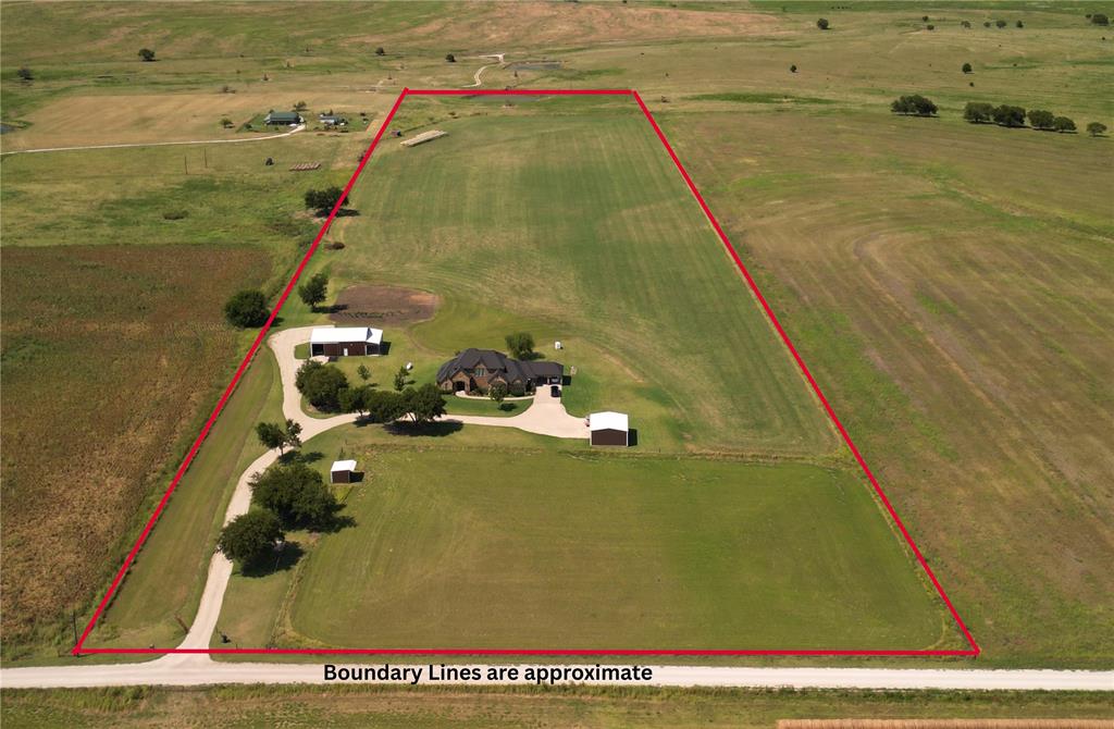 Experience the freedom and potential of 25 acres of open North Texas land, perfectly suited for ranching, livestock, equestrian use, or building out your dream country estate. With expansive pastureland and wide-open views, this property offers endless opportunities to create a custom setup tailored to your needs—whether that’s horses, cattle, additional structures, or simply room to roam.
The land is complemented by a 3-stall barn with covered trailer parking and a large shop with concrete floors and electricity, making it functional and ready for agricultural or recreational use from day one.
A custom-built home sits on the property, offering over 3,600 square feet of living space with an open-concept layout, flexible living areas, and thoughtfully designed features for everyday comfort. While the home provides a strong foundation, the true value lies in the acreage and its versatility.