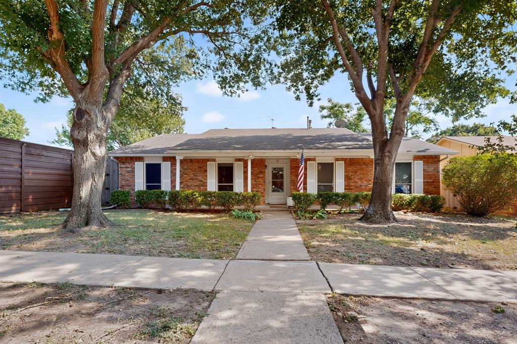 Location, location, location! Ideally situated in the heart of North Dallas, this well-maintained home offers quick access to US 75, I-635, Richland College, shopping, dining, parks, and major employment centers, making everyday commuting and conveniences just minutes away.
The home is equipped with a solar panel system, offering energy-efficient living and the potential for long-term savings on electricity. Inside, you'll find nearly 1,850 square feet of thoughtfully designed living space featuring 3 bedrooms, 2 bathrooms, vaulted ceilings with exposed beams, abundant natural light, and a spacious living room anchored by a painted brick fireplace. The oversized kitchen offers abundant cabinetry, generous counter space, a breakfast bar, and an adjoining dining area overlooking the backyard.
Durable tile flooring throughout provides easy maintenance, while the spacious primary suite features a walk-in closet and private bath. Two additional generously sized bedrooms offer flexibility for family, guests, or a home office. Step outside to a covered patio and private fenced backyard shaded by mature trees, creating the perfect setting for entertaining, relaxing, or enjoying time with family and friends.
Offered AS-IS and priced accordingly, this home presents an outstanding opportunity to move in and enjoy today while adding your own personal touches over time. If you've been searching for a home that combines an unbeatable location, generous living space, energy-efficient features, and exceptional value, this is one you won't want to miss.