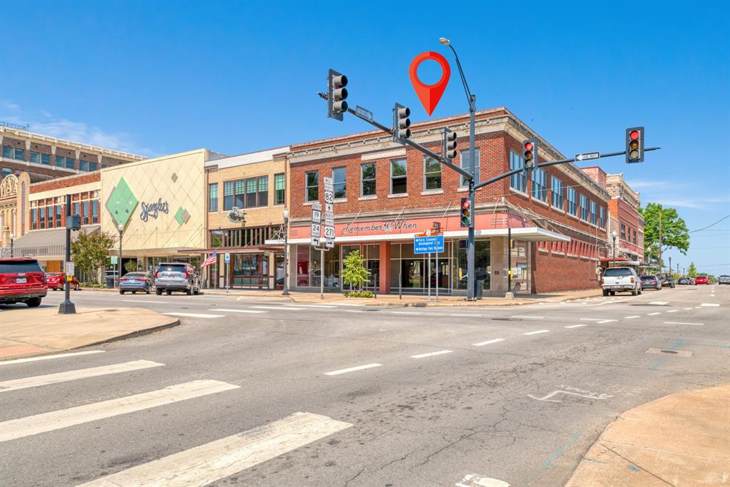 Great opportunity to own a piece of Paris, Texas history! Located on the North corner of the Plaza, also known as The Square and included in the Paris Downtown Historic District, is this 2-story building built in 1916 with over 11,500 square feet of usable space.  Known as The Woolworth Building, the first floor is an open canvas to be developed into retail, restaurant or whatever your creative vision might be with high ceilings and lots of natural light.  The upper floor with its magnificent view of the Paris center square could be perfect for multiple loft apartments or an executive styled Air BandB with walls of windows and hardwood floors.  Seller has drawings-plans for build out of the 2nd floor available to share.  The building features a basement and an elevator, street access to both the Plaza and North Main promoting even more opportunity for future use.  Downtown Paris is continuing to evolve with many retail businesses and eateries.   Several city sponsored annual events bring in thousands of people who stroll the area and enjoy all the amenities of the area.  Downtown merchants work together and promote walking events year-round that draw crowds as well. Bring your vision, your entrepreneurial spirit and take a look!