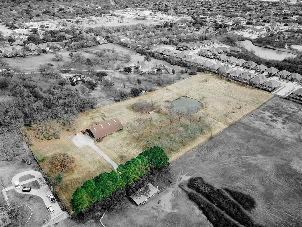 Rare opportunity to own 5.87 acres of beautiful land in one of South Denton’s most sought-after areas. This exceptional property features a mature pecan orchard and a peaceful pond, offering natural beauty and a rich history as a former ranch where Clydesdale horses were once raised. With access from El Cielito Street within the Montecito neighborhood and additional frontage on the opposite side of the property, this tract provides
outstanding flexibility for future use.

The setting is truly unique—bordered by well-established homes on large, estate-sized lots in Montecito on one side, while the other side backs up to an existing residential development, creating a rare blend of privacy, prestige, and proximity. Whether envisioned as the site for a private dream home or an incredible development opportunity in a rapidly growing and highly desirable area, this land offers exceptional potential. Acreage of this size, character, and location is extremely rare in Denton and seldom becomes available.