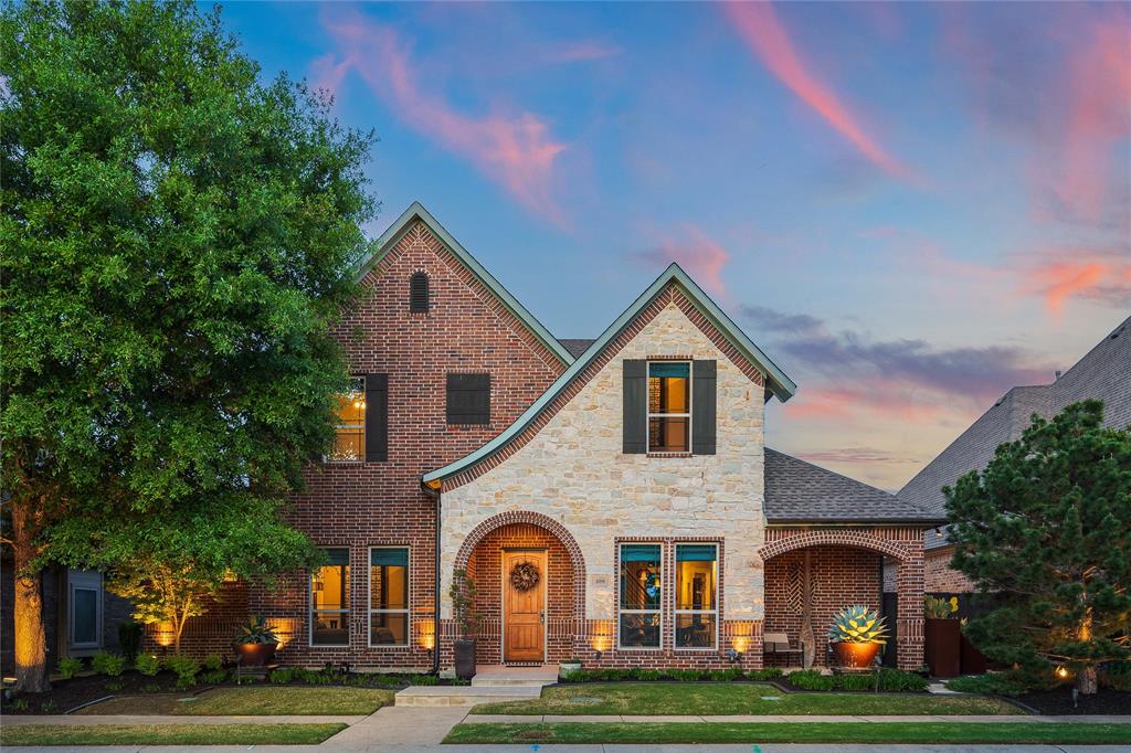 A truly one-of-one showpiece, this exceptional residence is positioned in the highly sought-after Ballantrae enclave of Stonebridge in McKinney. From the moment you arrive, the home’s striking curb appeal sets the tone—lush landscaping is enhanced by a professionally designed outdoor lighting system by Signature Illuminations Designs, creating a memorable presence day and night. The resort-caliber backyard, designed by Aquaterra Outdoors and showcased as “Shadywood,” is extraordinary. Anchored by a stunning resort-style pool, the space is built for relaxation and elevated entertaining. A 10-foot fire pit with an 8-foot burner serves as a dramatic focal point, while a custom steel-framed IPE wood pergola provides a refined lounge setting. The fully equipped concrete outdoor kitchen—featuring a large Green Egg, stainless steel drawers, and custom cabinetry—is complemented by a striking steel-framed IPE wood backdrop. Inside, an open, light-filled layout pairs with modern finishes that exude warmth and sophistication. The grand entry showcases custom Alder detailing, while a floating wood and steel staircase creates a bold architectural statement. A private office overlooking the backyard offers a serene workspace. The chef-inspired kitchen, renovated in 2024, features a beamed ceiling, upgraded lighting, designer tilework, new countertops, soft-close cabinetry, and premium appliances—ideal for everyday living and entertaining. The 1st floor primary suite is a true retreat, complete with a spa-like bath featuring a double concrete sink atop a custom Tiger wood vanity, Italian porcelain tile, an oversized shower with built-in seating, and a bubble massage air bath. Upstairs, two additional bedrooms and a spacious game room provide flexibility. An oversized 2 car garage with epoxy flooring, a Container Store storage system, and a workbench adds prime functionality. Thoughtfully curated, this home presents a rare opportunity to own a distinctive McKinney property.