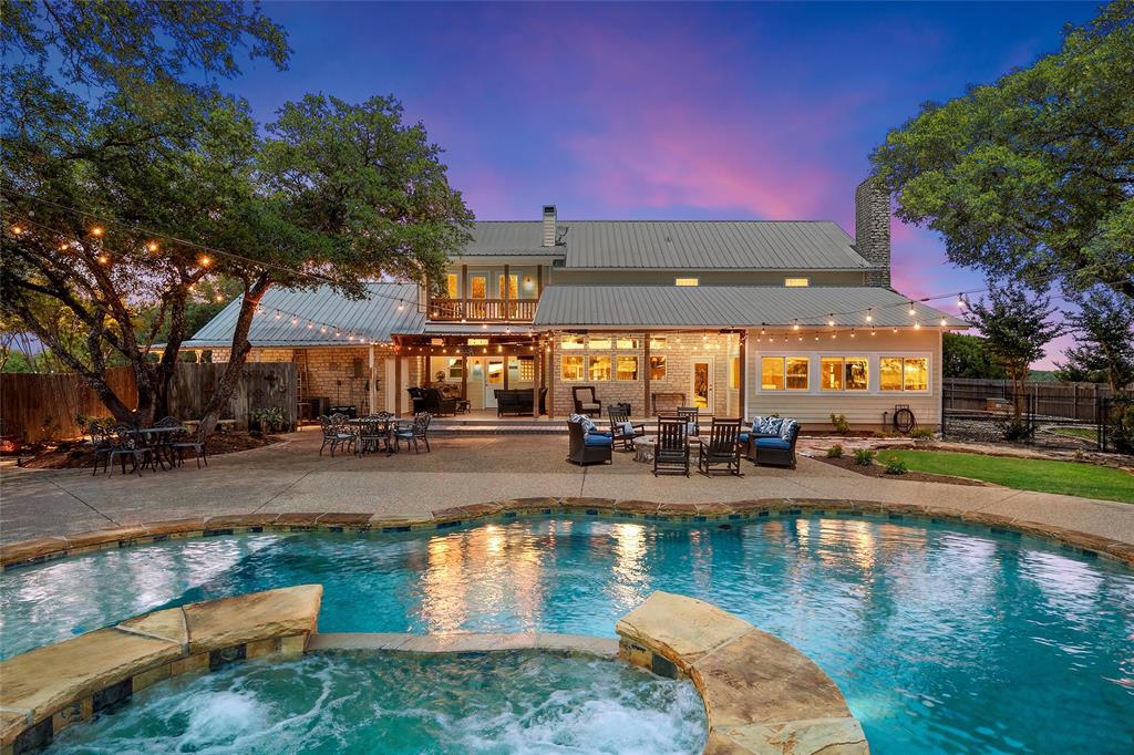 Experience the perfect blend of country living and equestrian excellence at Broken Water Ranch.  This beautifully maintained 3,852 sqft, ranch-style home is located in Crawford ISD and features four bedrooms and three bathrooms, with every bedroom offering direct balcony access and stunning views of the surrounding landscape.  The private primary suite is a true retreat, complete with its own fireplace and balcony access from the bedroom and en-suite bath.  

Designed for entertaining and everyday living, the gourmet kitchen boasts three ovens, a fireplace, a trash compactor, hanging pot rack, and abundant counter space and bar area.  The adjoining den features a fireplace and picturesque views of the sparkling pool and outdoor living spaces. A dedicated piano room with built-in bookshelves provides the perfect setting for music, reading, or a home office.  A bright sunroom offers a peaceful place to enjoy morning coffee, and provides access to a fenced dog run.  

Outside, you'll find a resort-style pool and hot tub, expansive outdoor living and entertaining areas, a fire pit, covered patio, and string lighting tucked beneath mature oaks that provide abundant shade and character.  Equestrian enthusiasts will appreciate the outstanding horse facilities including a lighted arena that allows for riding and training well into the evening, a stable with four Priefert stalls, a tack room, and attached equipment and hay shed. The property is pipe-fenced with no-climb horse fencing for safety and durability.  Workshop and storage building.  

With frontage on HWY 6 and Chapman Rd, this property offers convenience and privacy.  A circular driveway for added parking and meticulously maintained landscaping completes the package.  Every detail of this remarkable property reflects pride of ownership and exceptional care.  This is a rare opportunity to own this county estate with room to live, entertain, and enjoy the best of Texas Ranch living.  Schedule your tour today!