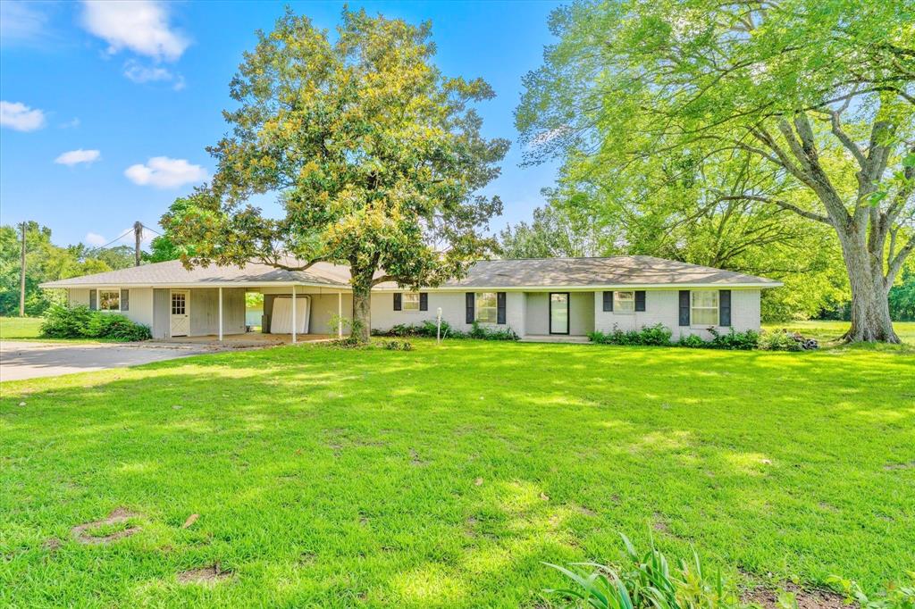Rare find just minutes from Mount Pleasant! This 25-acre property offers the perfect blend of open pasture and mature trees,
creating a beautiful setting for peaceful country living. The spacious 2,700+ sq. ft. home features 4 bedrooms, 3 bathrooms, 2
living areas, a 2-car carport, attached storage, and a detached workshop. Relax and take in the views from the oversized
covered back porch, ideal for morning coffee, entertaining, or enjoying the quiet surroundings. With room to roam, space for
hobbies, and convenient access to town, this property is a must-see!