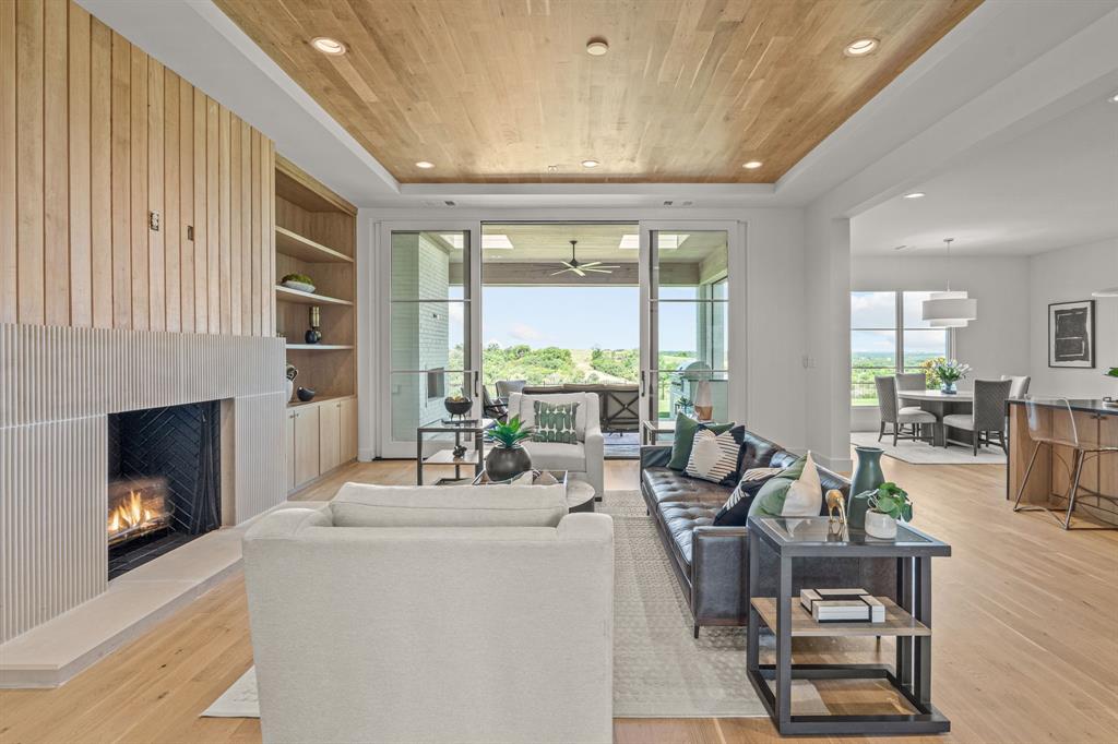 Welcome to luxury living in the exclusive, gated, and 24-hour guarded Montrachet neighborhood. This stunning new construction by Olerio Homes is situated on a spacious 0.5-acre bluff lot, offering breathtaking views and unparalleled elegance. Spanning 5,593 square feet, this meticulously designed home features high-end finishes throughout. The main floor boasts a formal dining room and study off the entrance, an open concept kitchen, living, and casual dining area with a butler’s pantry and separate prep kitchen, a spacious living room with built-ins, a cozy fireplace, and wine room. First-floor guest suite and primary suite that includes an oversized bath and custom closet. The second floor offers 3 additional ensuite bedrooms, a game room, and fitness area. Designed for comfort, elegance, and functionality, this Olerio Homes creation provides an unparalleled lifestyle in the serene and secure Montrachet neighborhood.