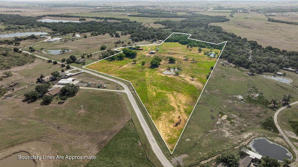 12932 Ragsdale Circle presents a rare opportunity to own approximately 18.73 acres in the heart of one of North Texas’ fastest-growing corridors. Currently utilized as a horse property, this beautiful tract offers the perfect blend of open space, mature trees, scenic natural beauty, and future potential.
With excellent road frontage and a picturesque creek running through the property, the land provides an ideal setting for a private ranch estate, custom home, equestrian facility, or future development opportunity. Towering trees create privacy and character, while the gently rolling terrain offers multiple prime building sites.
Located near the continued growth of Aubrey and the expanding North Texas market, this property is perfectly suited for developers, investors, or buyers looking to build a dream home with room to roam. Whether you envision a luxury ranch retreat or future residential development, this versatile property offers endless possibilities in a highly desirable location.  A truly unique opportunity to secure acreage, beauty, and future upside all in one exceptional property.