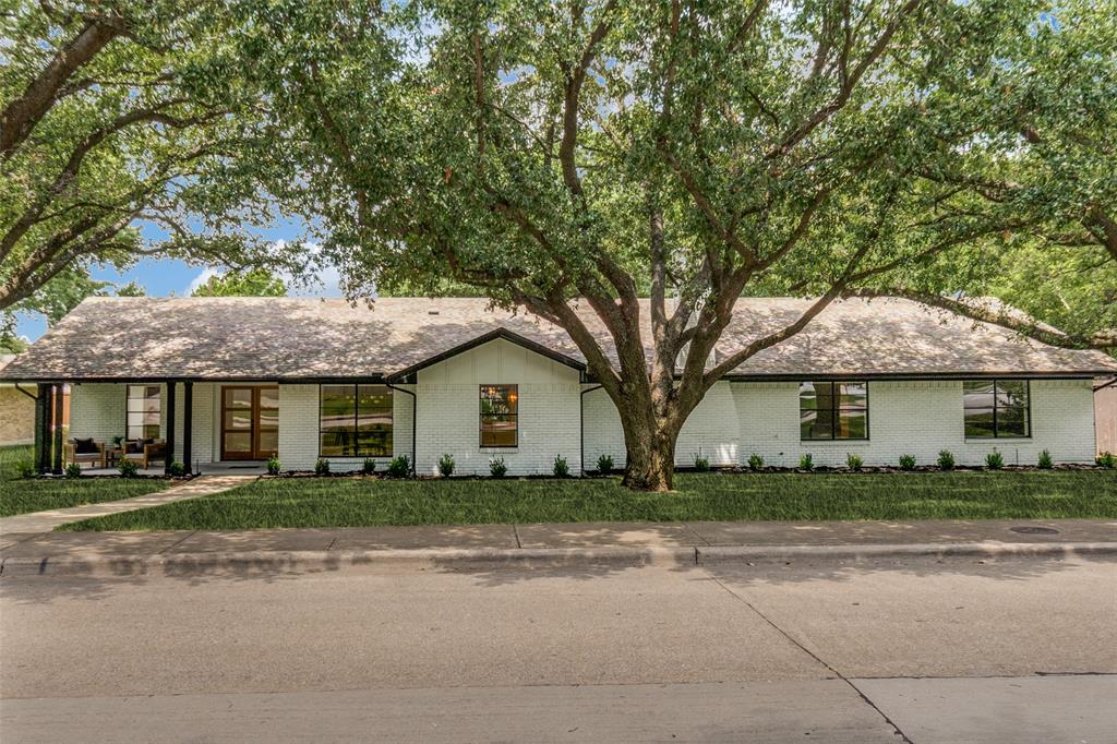 Completely reimagined and renovated from the studs out, this stunning 4-bedroom, 3-bath residence sits on an expansive 110' x 135' lot beneath a canopy of mature trees in one of Dallas’s most desirable neighborhoods. Thoughtfully redesigned with a bright, open-concept floorplan, the home seamlessly blends modern elegance with everyday functionality. At the heart of the home is a show-stopping chef’s kitchen featuring custom cabinetry, a dramatic waterfall island, quartz countertops, premium appliances, abundant storage, and designer lighting. Multiple living and dining spaces provide flexibility for entertaining and daily living, while wide-plank hardwood floors, curated finishes, and elevated design details create a cohesive, sophisticated feel throughout. The spacious primary retreat offers a true escape with room for a sitting area, dual walk-in closets, and a beautifully appointed spa-inspired bath complete with oversized walk-in shower and dual vanities. Three additional bedrooms and two fully renovated baths provide comfortable accommodations for family and guests. Large windows and expansive sliding glass doors flood the home with natural light and create effortless indoor-outdoor living. The oversized backyard offers endless possibilities for entertaining, play, or future pool plans, all framed by towering mature trees and generous green space. A three-car garage and extensive recent improvements complete this exceptional property. A rare opportunity to own a turnkey home on an oversized lot in Dallas’s coveted Private School Corridor, just minutes from premier schools, shopping, and dining.