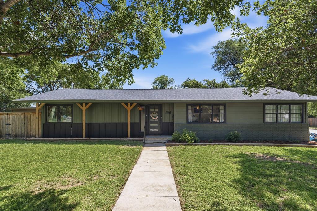 Step into modern comfort & timeless style with this completely remodeled 4-bedroom, 3-bathroom home designed for both everyday living and entertaining. Featuring two spacious living areas, this stunning property offers a seamless blend of functionality, warmth, and upscale finishes throughout. The inviting living room is anchored by a beautiful brick fireplace with a built-in electric fireplace, creating the perfect atmosphere for relaxing evenings or gatherings. Thoughtfully designed with engineered hardwood flooring throughout the main living spaces & durable waterproof vinyl flooring in the bathrooms and laundry room, every detail of this home reflects quality craftsmanship & intentional design. The gourmet kitchen is sure to impress with custom countertops, stainless steel appliances, and a convenient pot filler over the range — ideal for those who love to cook and entertain. Each bathroom has been tastefully updated with designer tile showers, bathtubs, and stylish modern fixtures. The spacious primary suite serves as a private retreat featuring dual sinks, a granite vanity countertop, and a spa-inspired feel. Additional interior highlights include recessed LED lighting, ceiling fans, and built-in storage within bedroom closets for maximum organization and convenience. The thoughtfully designed mudroom offers practical luxury with a designated laundry basket station, cubbies, and a wash sink to simplify daily routines. Outside, enjoy a beautifully landscaped setting complete with mature trees, a large backyard, wood privacy fence, gated driveway, courtyard, and an inviting deck perfect for outdoor entertaining or peaceful evenings at home. This move-in ready modern home combines elegant updates, versatile living spaces, and exceptional outdoor amenities — creating the perfect place to call home.