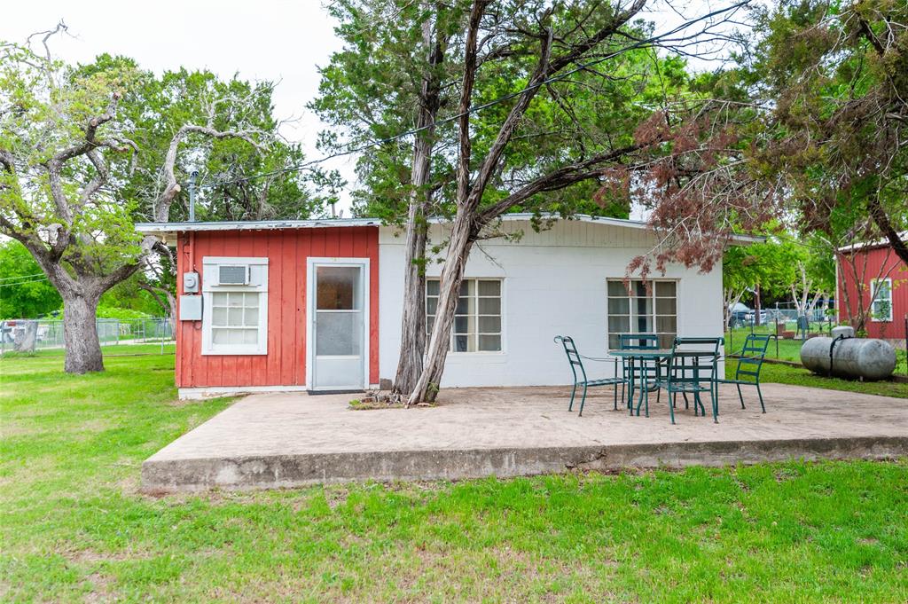 MOTIVATED SELLERS - Embrace the lake life in this charming 1-bedroom, 1-bathroom single-story home nestled in the quiet Cedar Crest subdivision of Whitney, TX. Spanning 900 square feet, this cozy detached lake house sits on an oversized level lot featuring a spacious layout with plenty of room for outdoor entertainment, gardening, or a future expansion. The interior offers a comfortable eat-in kitchen and a warm, inviting living space centered and a classic wood-burning fireplace.Perfect as a peaceful full-time residence, an affordable weekend getaway, or a high-potential vacation home retreat, this property boasts no HOA fees. Enjoy effortless water access with a short walk to the shores of Lake Whitney for premier boating, fishing, and relaxation. Located within the highly-regarded Whitney ISD school district, the property utilizes co-op water, propane, and a septic system. Don't miss this serene escape from city life—BRING YOUR OFFER TODAY!
Buyer to verify accuracy of all information including but not limited to square footage, room sizes, lot sizes, all sizes, all features, schools, taxes, amenities, HOA, etc. Neither Seller nor their representative makes any warranties or representation as to accuracy.