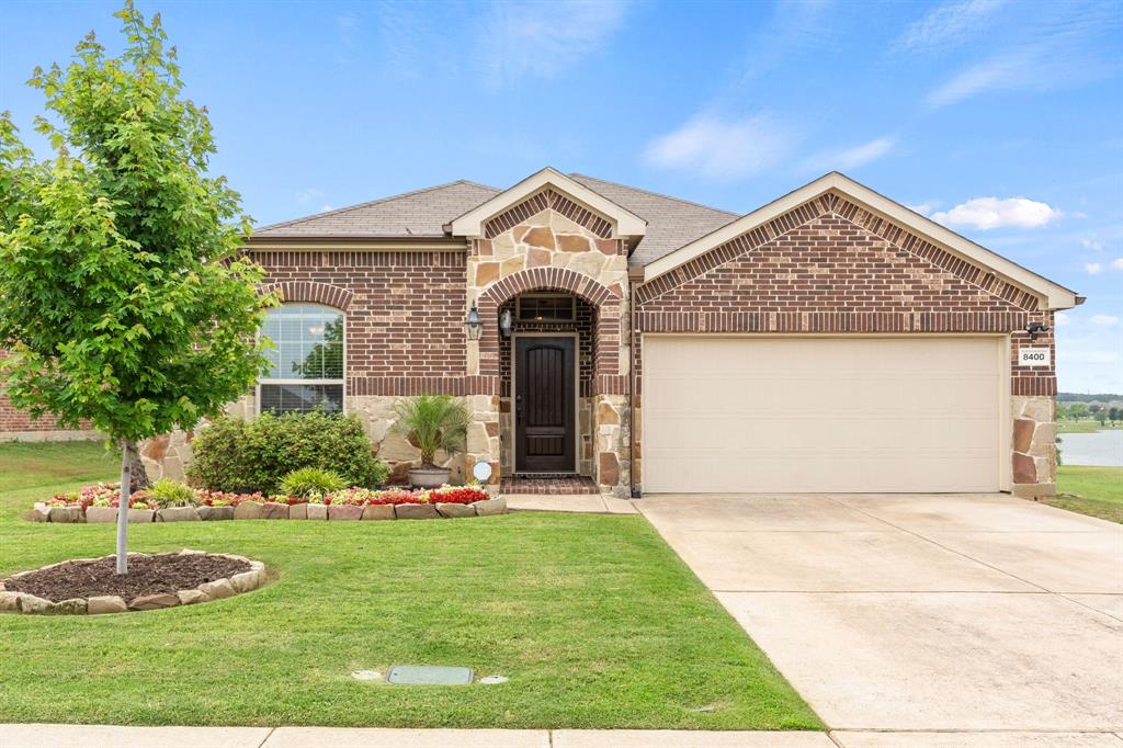 Set on one of the most private lots in Cross Oak Ranch, this home offers the kind of setting buyers are constantly searching for but rarely find. Backing to lake views with direct access to walking trails just beyond the fence line, this property creates a true sense of space, privacy, and separation from the typical suburban feel. This home delivers a lifestyle that feels quieter, calmer, and more connected to nature while still being minutes from Denton, Little Elm, and Lake Lewisville.

Inside, the floorplan is designed for the way people really live. A versatile flex space can be whatever you want. The open-concept kitchen overlooks the main living room, creating an easy flow for entertaining, everyday routines, and staying connected while cooking or hosting. 

Privately positioned away from the secondary bedrooms, the primary suite offers a spacious escape with dual vanities, a soaking tub, separate shower, and oversized walk-in closet.

Beyond the cosmetic updates, this home is packed with energy-efficient upgrades that matter long term, including Low-E windows, radiant barrier roof decking, blown-in insulation, programmable thermostat, energy-efficient appliances, and built-in pest control. These are the features that help keep utility costs lower and day-to-day living more comfortable year-round.

Residents of Cross Oak Ranch enjoy resort-style community pools, stocked fishing lakes, parks, playgrounds, basketball courts, greenbelts, and miles of walking trails throughout the neighborhood. With convenient access to Denton, Frisco, Little Elm, and major commuter routes, this location continues to attract buyers looking for more space, more privacy, and a stronger connection to the outdoors without sacrificing convenience.

This home is more than square footage. It’s privacy, flexibility, and the kind of everyday lifestyle that’s getting harder to find in DFW.