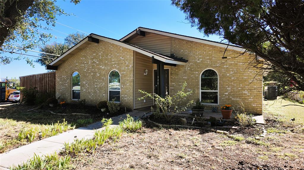 Welcome to 900 Overdowns Dr in Plano. This charming single story home sits on a corner lot with a spacious front yard and beautiful mature trees that offer shade and curb appeal. Inside you will find 1744 square feet of comfortable living space with three bedrooms and two updated bathrooms. The home features fresh interior paint, a cozy fireplace in the dining room, and a traditional layout with defined spaces for living and dining. The kitchen includes all appliances and is ready for move in. Located near parks, schools, shopping, and dining in Plano ISD this home offers convenience and comfort in a quiet established neighborhood. Vacant and easy to show.