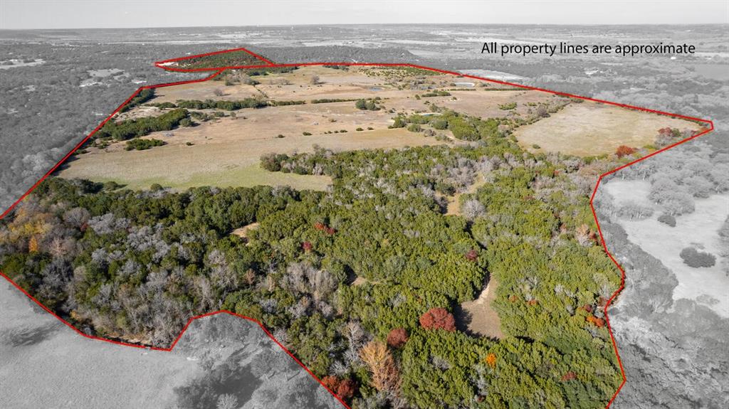 Beautiful turn-key Bosque County ranch ready for you and your family. This 188.5 acre ranch is located less than a mile west of Highway 6 at the Neils Creek Crossing. The existing brick home is 2,442sf (built in 1980). The home is perfectly adequate for immediate use or ready for you to make it your own. A 14-acre outparcel also conveys with an elevation of 820'. The hunting on this property has proven to be very good with many Whitetails harvested over the years. There are 5 stock tanks on the property that could possibly be merged into one larger lake. Remaining structures include a good metal 3-bay garage shop, water well, antique barn with pens, kids treehouse, open deck, firepit, and fenced lawn. Shoal Creek is the southern boundary (north bank) and hills rise up in all directions which gives one the feel of a much larger property.  This is a very nice family ranch ready to go.  Convenient, pretty, diverse, private, and hunting productive.