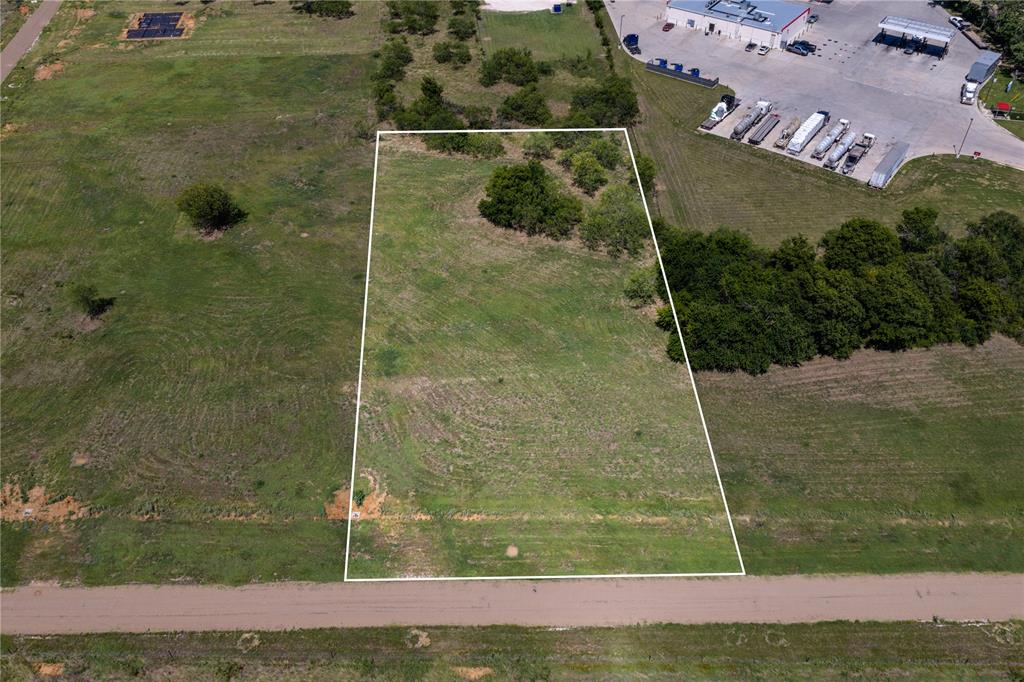 Build your dream home on this open 1.5 acre Lot 5 in Lakewood Acres, conveniently located within the city limits of Whitney and just minutes from beautiful Lake Whitney. The open layout gives you plenty of flexibility for your home, shop, outdoor living space, and more. Community features include a private entrance, chip-sealed roads, city water, and underground electric, with deed restrictions that align with City of Whitney standards. Enjoy the convenience of being close to town while still having room to spread out, beautiful Texas surroundings, and frequent wildlife sightings. Acre-plus lots in a location this close to both town and Lake Whitney are hard to find!