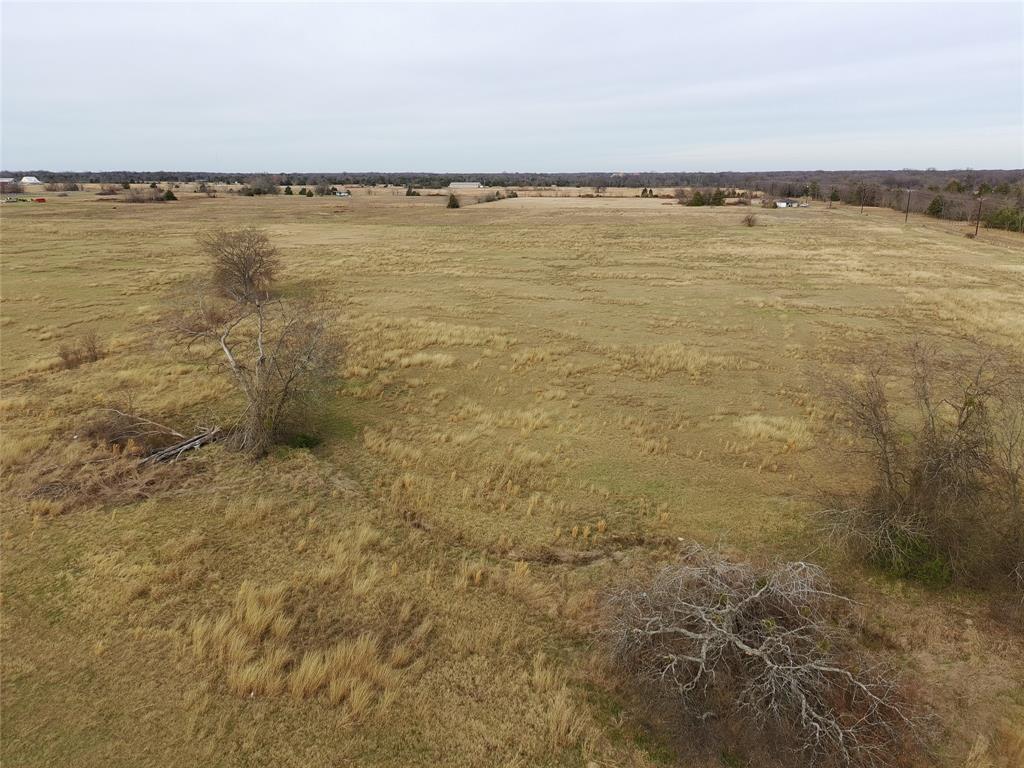 10 acres of Beautiful ready to build country land minutes from Jim Chapman Lake and Sulphur Springs. Water and Electric available at the street. No Restrictions!  All the peace of the countryside but close enough to restaurants and stores! Build your home and sit out at night and see all stars!