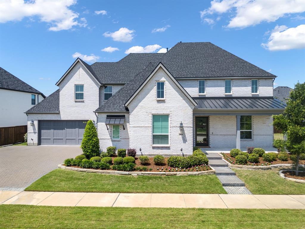 Welcome to refined luxury living in the exclusive Peninsula of Windsong Ranch, one of Prosper’s most coveted communities within highly acclaimed Prosper ISD. Built by Belclaire Homes, this custom residence offers architectural elegance, thoughtful design, and exceptional indoor-outdoor living on a .305-acre lot facing a tranquil greenbelt. A charming front porch overlooks the lush green space, creating a warm and inviting first impression.

Inside, soaring ceilings and expansive windows fill the living room with natural light, anchored by a statement fireplace and seamless flow into the heart of the home. Sliding glass doors open to the patio, extending the living space outdoors for effortless entertaining. The backyard is designed for elevated outdoor living with a custom pool and sunning ledge, spacious covered patio, built-in fire pit, and a covered pergola with a fully equipped outdoor kitchen and built-in grill.

The first-floor primary suite offers serene pool views and a spa-inspired bath with a freestanding soaking tub, complemented by separate his-and-her closets for optimal storage and organization. At the front of the home, a dedicated office captures peaceful greenbelt views across the street—an ideal setting for working from home. Upstairs, four generously sized bedrooms each feature a private en suite bath, along with a game room and media room for added flexibility.

Additional highlights include a 4-car garage, 5 bedrooms, 7 baths, and the quality craftsmanship expected in a Belclaire custom home. Windsong Ranch residents enjoy a resort-style lifestyle with the iconic 5-acre Crystal Lagoon, multiple pools, tennis and pickleball courts, fitness center, and miles of scenic walking and biking trails.