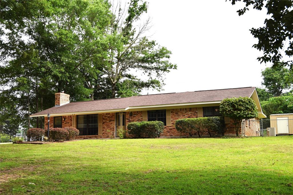 This is a really good location! It is minutes away from the Minden Tennis and Aquatic Club. The children could ride there bikes or walk to it.
The 3 bedroom 2 bath home has appox.2205 sq.ft. with a nice den with wood burning F.P., Kitchen with lots of cabinets and large area for a kitchen table. There is an additional room with built in cabinets that would make a great home office. There is a spacious laundry room with washer, dryer, and freezer(AS IS)The primary bedroom  is a nice size and the bathroom has a his and her sink ,large soaking tub, separate shower and his and her walk in closet. The back yard is fenced. The roof was replaced a few years and the outside of the house was painted this year!
Please call today to view this home!