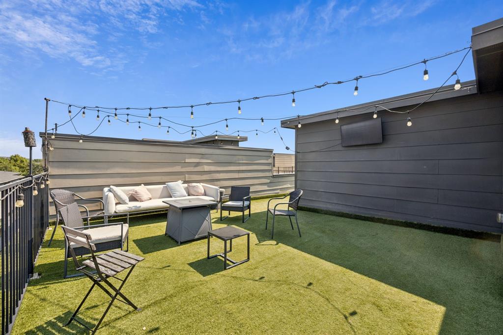 Spread across four levels, this stunning corner-unit townhome offers the perfect blend of style, function, and city living. Featuring 2 bedrooms, 2.5 baths, and a two-car garage, this home boasts an open-concept living space and a sizable primary suite designed for comfort.

Enjoy an abundance of natural light thanks to the corner-unit positioning and numerous windows, plus take in unobstructed views of Dallas from your private rooftop deck — the perfect spot to entertain or unwind.

Thoughtful upgrades include finished flooring on the first floor, blinds throughout, and custom garage shelving for extra storage. As a bonus, you’ll have two additional parking spots conveniently located right next to the unit.

This home truly checks all the boxes — modern design, incredible views, and a location that puts you close to everything Dallas has to offer.