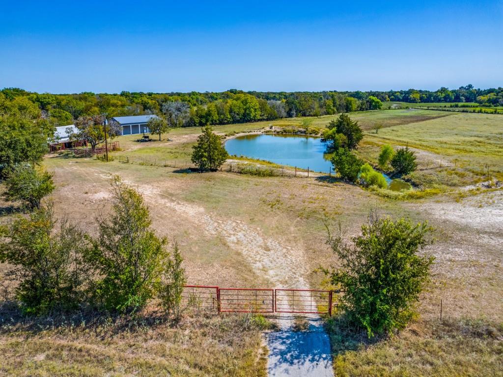 WELL MANICURED 176+- AC WITH 2 PONDS, 2400 sq. BUILDING , BUILT IN THE LAST 2 YEARS.  CORRALL WITH PEN AND TRACTOR SHED.  BEAUTIFUL TREES AND SO MUCH MORE. THIS PROPERTY IS ABSOLUTELY BREATHTAKING. NICE PLACES TO BUILD YOUR HOME. THIS PROPERTY IS CURRENTLY USED AS A WORKING CATTLE RANCH. THERE IS ALSO LOTS OF WILDLIFE ON THE PROPERTY INCUDING DEER AND HOGS. THIS IS DEFINATELY A PARADISE AND IS CLOSE TO SHOPPING AND IS IN THE HIGHLY DESIRED SCURRY ISD
Please see Virtual Tour URL