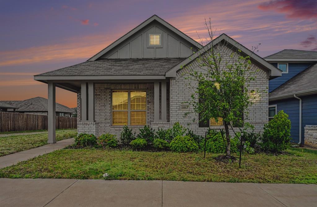 Step into this bright and airy Fort Worth home, in splendid condition. The entryway welcomes you into an open, unified living space, bathed in natural light, with ample room to relax with loved ones or entertain guests. The kitchen offers gorgeous granite counters, all stainless appliances, a two-basin island sink, bar seating, and abundant cabinet & pantry storage. The split main bedroom is spacious and includes a gleaming en suite bath with an expansive vanity & makeup counter, an oversized tub, and two closets. Out back, find a backyard enclosed with six-foot privacy fencing and a concrete patio as well as the alley-entry two car garage with plenty of extra storage space. Community amenities include a playground, a dog park, and lots of walking & jogging trails. Easy access to I30 and Loop 820. Minutes from Downtown Fort Worth, the historic Fort Worth Stockyards, and lots of shopping & dining options, as well as fabulous 3,400-acre Lake Worth with boating, fishing, parks, an amazing Nature Center, and more.  OWNER FINANCE AVAILABLE.  call agent for details.