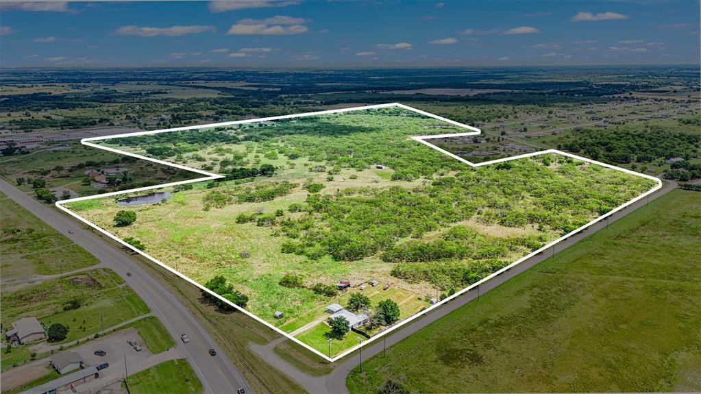 Rare offering of 105 pristine acres with prime Highway 205 frontage in Kaufman County's fastest-growing corridor. This strategically positioned tract offers unparalleled development potential just 30 minutes from Dallas in the rapidly expanding Terrell-Rockwall growth path.

STRATEGIC LOCATION ADVANTAGES:
Prime positioning on Highway 205, the major north-south arterial connecting I-20 and I-30. Property benefits from immediate proximity to Buc-ee's, Shops at Terrell, and Crossroads at Terrell development. TxDOT highway expansion to 6 lanes currently underway, driving significant value appreciation.

PROPERTY FEATURES:
105± acres of diverse topography with mesquite trees
Substantial Highway 205 frontage providing excellent visibility and access
Multiple water features including ponds and seasonal creek
Mix of open pasture and wooded areas ideal for varied development
Rolling terrain with elevation changes creating natural building sites
Agricultural exemption in place providing substantial tax benefits
Multiple utility connections available at property boundaries

Buyer to verify all information.  Selling Agent is related to Seller.