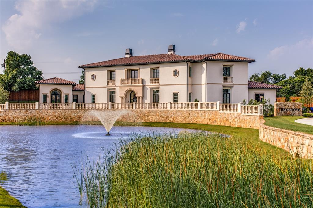 Introducing a masterpiece of modern luxury living in the heart of Southlake crafted by the esteemed Willowtree Custom Homes and nestled within the exclusive new development of The Canopy. This stunning custom-built residence sits on a sprawling one-acre property, boasting a private pond and fountain maintained by the HOA. This architectural marvel offers an expansive 6,171 square feet of meticulously designed living space. The home is a perfect blend of sophistication and comfort centered around the art of entertaining, featuring a spacious great room with soaring ceilings and glass sliders that seamlessly blend indoor + outdoor living. The spacious outdoor patio is complete with automated privacy screens + built-in heaters, creating a serene setting to relax. The flex space off the patio is a haven for entertaining, with a private bar equipped with Sonic ice-maker + dishwasher. Additional features include a gated driveway, custom walk-in wine room, gym of primary + Lutron media system