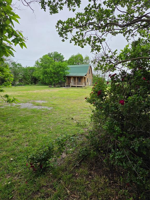 VA ASSUMABLE AT ONLY 2.75% 

Welcome to this adorable log cabin situated on just under 1 acre in a prime location right off Highway 121. Offering 2 bedrooms and 1.5 baths, this charming property combines rustic appeal with convenience.

The cabin’s warm wood tones and inviting layout make it a cozy residential retreat, while the excellent visibility and frontage along Hwy 121 provide exciting potential for commercial conversion. Whether you’re seeking a unique home or envisioning a business opportunity, this property delivers versatility and character.

Disclaimer: All information provided is believed to be reliable; however, it is not guaranteed. Buyers and their agents are responsible for independently verifying all details.