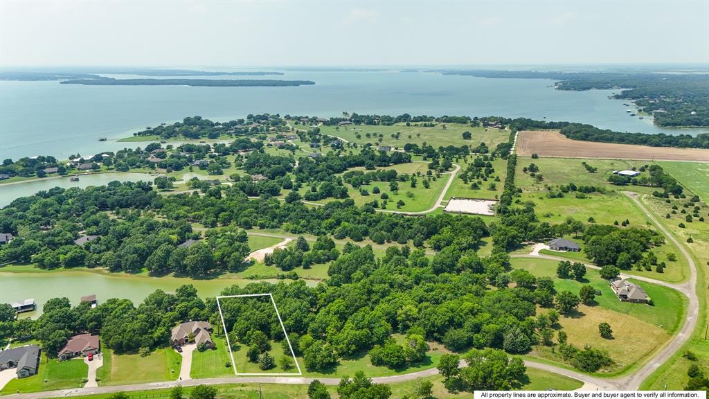 Opportunities to own multiple adjoining lots in a gated Richland Chambers community! This .68-acre homesite in Baybridge gives you the freedom to build now, expand later, or secure additional acreage for added privacy, outdoor living space, or future plans.
Surrounded by beautiful custom homes and mature lakefront scenery, this property offers the perfect setting to create a retreat that's uniquely yours. Whether you're envisioning a weekend escape, a place to gather with family and friends, or a full-time residence where every day feels a little more relaxed, Baybridge provides the backdrop for it all. The gated community features a minimum 2,000-square-foot build requirement and offers convenient access to Richland Chambers Reservoir, where boating, fishing, and sunset cruises are part of everyday life. Lots 15 and 16 are also available, giving buyers the rare opportunity to own more than 2.7 acres combined at a discounted package price.