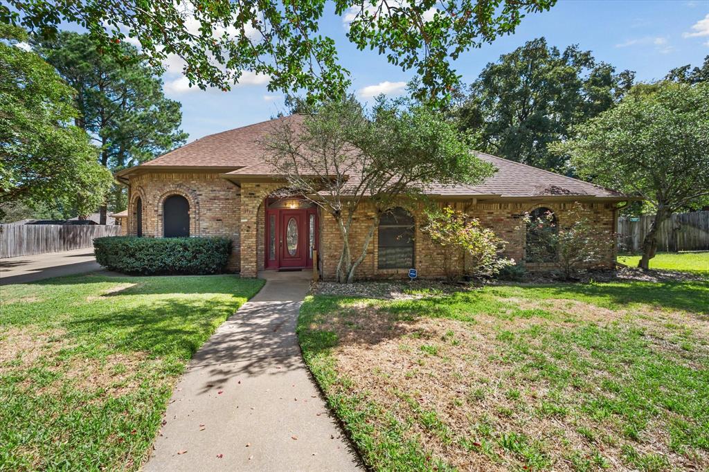Nestled in one of the most sought-after and exclusive neighborhoods, this meticulously crafted custom home offers unparalleled luxury and comfort. Boasting 3 spacious bedrooms and 3 elegant bathrooms, this residence is the epitome of fine living. Upon entering, you'll be captivated by the grandeur of this home. Spacious Living Room has 10 ft ceilings, fireplace and built-ins. Living Room overlooks the patio and private large backyard with trees. Primary bedroom features a cozy fireplace, French doors that open to patio and 2 walk in closets. Primary bath has a striking stained glass design above the soaking tub. Formal Dining has a beautiful etched diamond beveled windows with a ton of natural light. Large laundry room that has enough room for fridge or freezer. The attention to detail is evident throughout, making it a true masterpiece of architectural design. This is a MUST SEE!