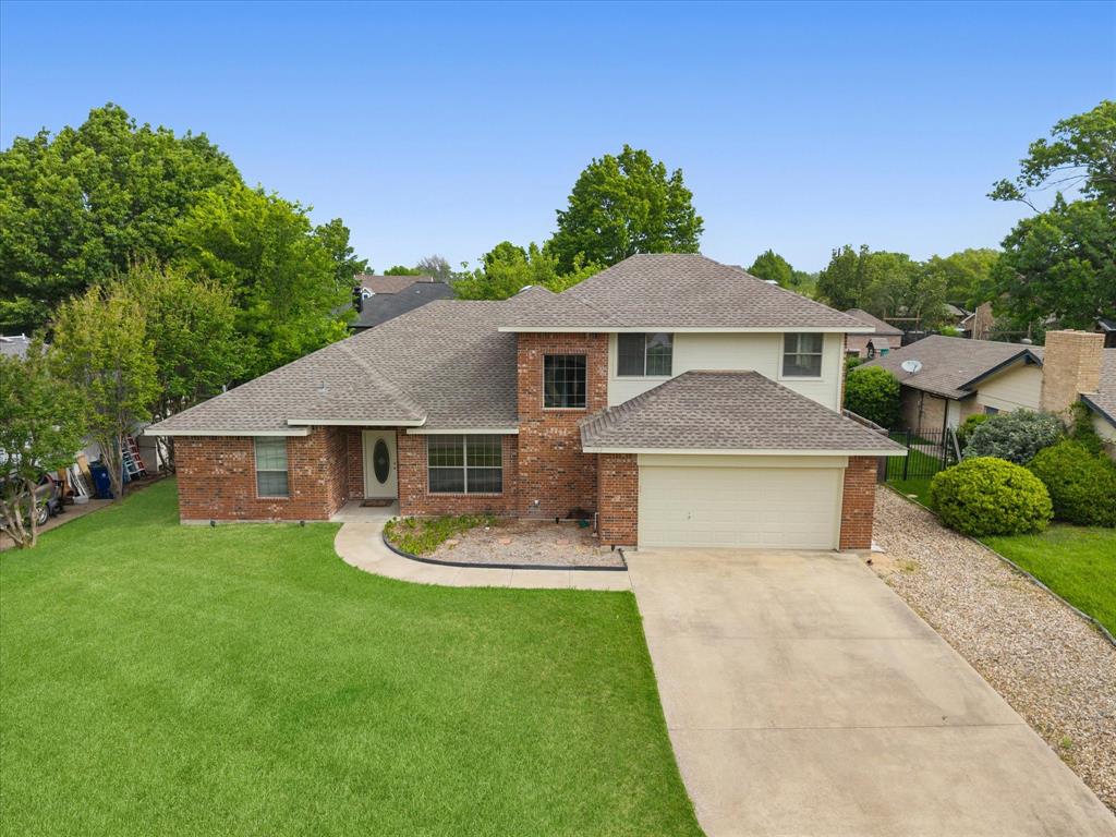 Stunning 4-bedroom, 3-bath home in a desirable lakeside community just minutes from Lake Ray Hubbard—ideal as a full-time residence or weekend retreat. This beautiful home features a spacious open-concept living area that flows seamlessly into the dining space, perfect for hosting gatherings. The family room showcases a charming fireplace and large windows that fill the space with natural light. The kitchen opens to the family room and offers abundant cabinetry, a breakfast bar, pantry, and stainless steel appliances—perfect for both everyday living and entertaining.
Unwind in the private primary suite, complete with a sitting area and a spa-inspired ensuite bath featuring a soaking tub, walk-in shower, dual vanities, and a generous walk-in closet. Three additional bedrooms are well-sized, each with ample closet space and convenient access to full baths.
Step outside to an expansive covered patio overlooking a large, fenced backyard—ideal for outdoor entertaining or relaxing evenings. Additional highlights include a spacious laundry room and a 2-car garage. Conveniently located near top-rated schools, marinas, dining, shopping, and major highways for easy commuting. Experience the best of lakeside living—don’t miss this opportunity!