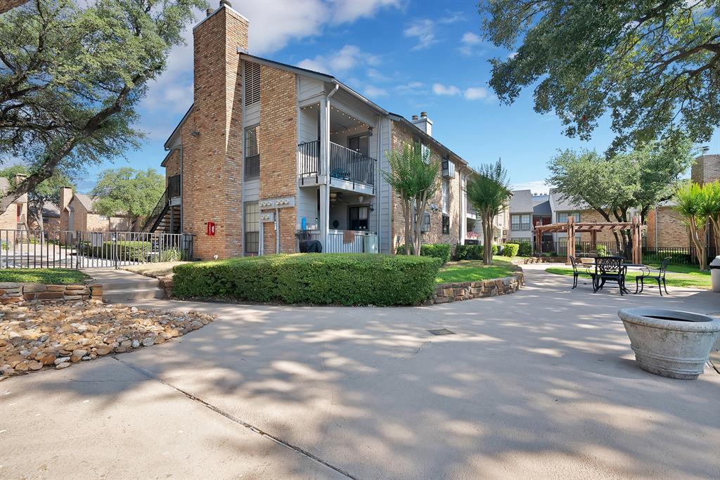 Turnkey and beautifully updated, this top-floor one-bedroom retreat sits in the sought-after Preston Bend Village community in the heart of North Dallas, centrally located right off Preston and Belt Line, just minutes from the Dallas North Tollway and LBJ Freeway. Fully renovated in 2021 and meticulously maintained, the home offers a bright, open living area warmed by a gas fireplace, plus a private balcony perfect for morning coffee with a pool view. As a second-floor unit, you get added privacy and no neighbors overhead. Major updates include: a brand-new roof (2026), water heater (2024), and a replaced AC (2018), along with refreshed landscaping and exterior paint within the past year. Residents enjoy a sparkling community pool and hot tub, shaded pergola courtyards, and reserved parking. Grocery, shopping, and dining sit within a half-mile. Currently a successful short-term rental, this is a rare turnkey opportunity. Furnishings available with an acceptable offer.