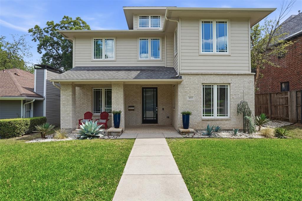 Step inside a home that beautifully balances the historic charm of its neighborhood with breathtaking modern luxury. Situated on an expansive, deeply landscaped lot of nearly 10,000 square feet, 6010 Belmont welcomes you with dramatic architectural scale, anchored by an astounding 20-foot grand entry and a two-story formal living room filled with natural light, rich oak hardwoods, and a cozy signature fireplace. Designed for effortless entertaining and true indoor-outdoor living, four panels of 10-foot multi-sliding glass doors completely disappear into the wall, seamlessly opening the entire main floor to your own private backyard resort. This outdoor oasis is anchored by a magnificent heated pool, complete with a relaxing hot tub, a sun-drenched tanning ledge, and a specialized built-in constant-current swim system for daily workouts. An expansive covered patio offers the perfect footprint for al fresco dining alongside the sparkling water. Back inside, the heart of the home is the epicurean kitchen, featuring a sprawling granite island, premium gas cooktop, and double ovens. Downstairs, the primary suite serves as a peaceful, boutique-hotel style retreat with unobstructed pool views and a massively scaled walk-in wardrobe gallery that feels like a high-end boutique. Upstairs, you'll find two additional spacious bedrooms alongside a versatile loft space, offering the easy flexibility to convert into a fourth bedroom if needed. Storage and parking are a breeze thanks to a rare, detached oversized 3-car garage. Tucked away in the coveted Belmont Conservation District, and just seconds from the local fire station for ultimate safety and peace of mind, you’ll enjoy quiet neighborhood tranquility just blocks from the vibrant energy of Lower Greenville, a short stroll to Tietze Park, and minutes from the iconic Lakewood Shopping Center and downtown Dallas.