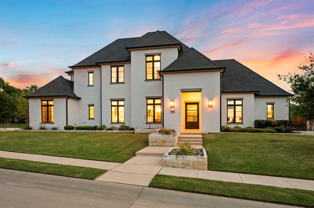 Welcome to this stunning custom modern luxury home by Larry Stewart, perfectly positioned on a coveted corner lot and meticulously maintained by its original owners. From the moment you step inside, rich hardwood floors guide you through a thoughtfully designed open-concept layout filled with natural light and elevated finishes throughout. A private office sits just off the entry, while the expansive living room showcases striking cedar beams and a wall of glass slider doors that seamlessly blend indoor and outdoor living. Designed with entertaining in mind, the home features a stylish wet bar with wine refrigerator and built-in cabinetry, flowing effortlessly into the chef’s kitchen complete with Thermador appliances, built-in refrigerator, 6-burner gas cooktop, Miele coffee maker, walk-in pantry, and abundant counter space. Two additional flexible spaces offer the perfect setup for a second office, planning center, or prep room. The first-floor primary suite is a true retreat, offering a spa-inspired bath with soaking tub, separate shower, and dual custom walk-in closets. A secondary bedroom with a full bath on the main level provides ideal accommodations for guests or multigenerational living. The downstairs media room adds even more versatility for relaxing or entertaining. Upstairs, a quaint loft creates the perfect sitting area, leading to two generously sized bedrooms, each with ensuite baths and walk-in closets. Step outside to your private backyard oasis featuring a covered patio, sparkling pool and spa, outdoor kitchen, and inviting living area with fireplace. A charming pergola offers additional seating, creating the ultimate space for year-round entertaining. This exceptional home combines luxury, comfort, and functionality in every detail, an incredible opportunity you won’t want to miss.